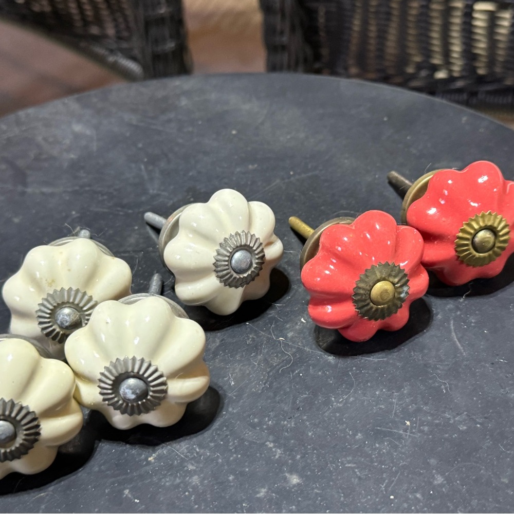 6 Anthropologie knobs and 1 hanging hook